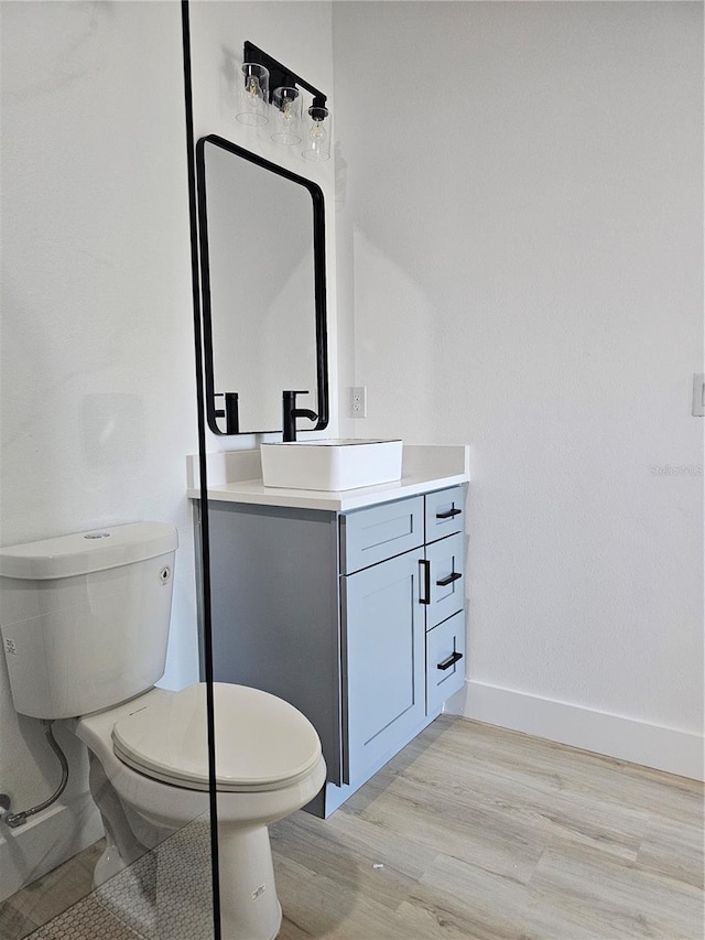 8249 Dimstead St, Port Charlotte, FL 33981 - bathroom with vanity and wood finished floors