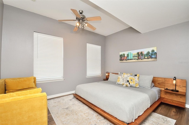 bedroom featuring ceiling fan and dark hardwood / wood-style flooring