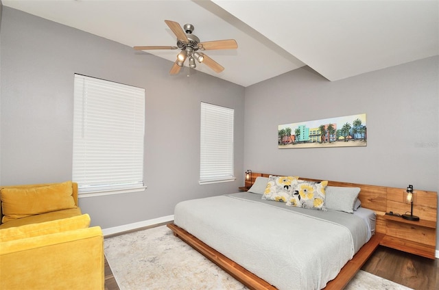 bedroom with ceiling fan and wood-type flooring