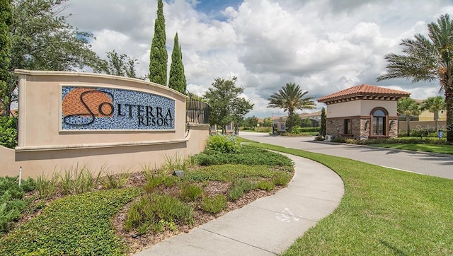 view of community featuring a lawn