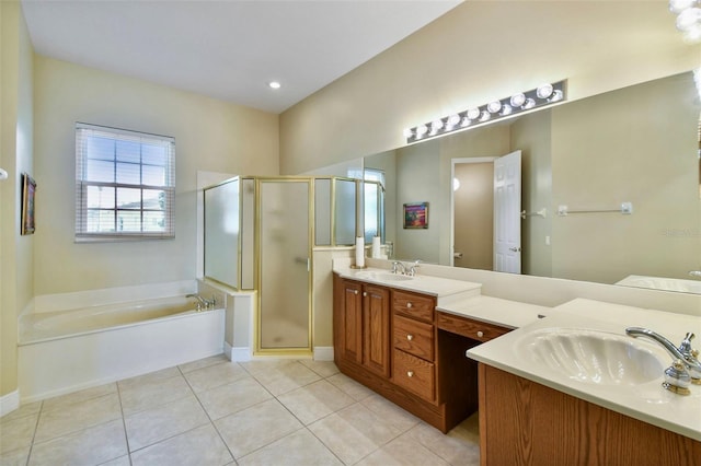 bathroom featuring tile patterned flooring, vanity, and shower with separate bathtub