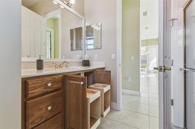 bathroom with vanity and tile patterned floors