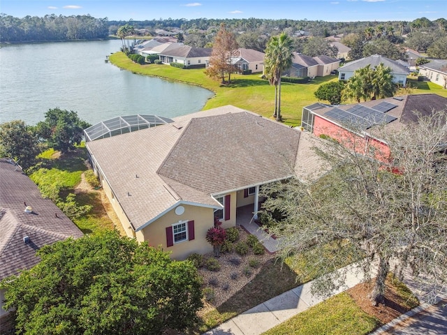 bird's eye view with a water view