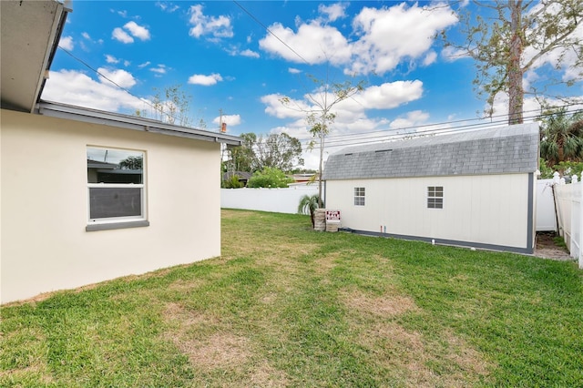 view of yard with a storage shed