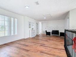 interior space with hardwood / wood-style floors