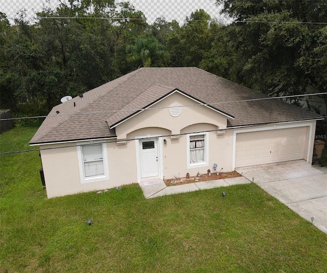 ranch-style home with a garage and a front lawn