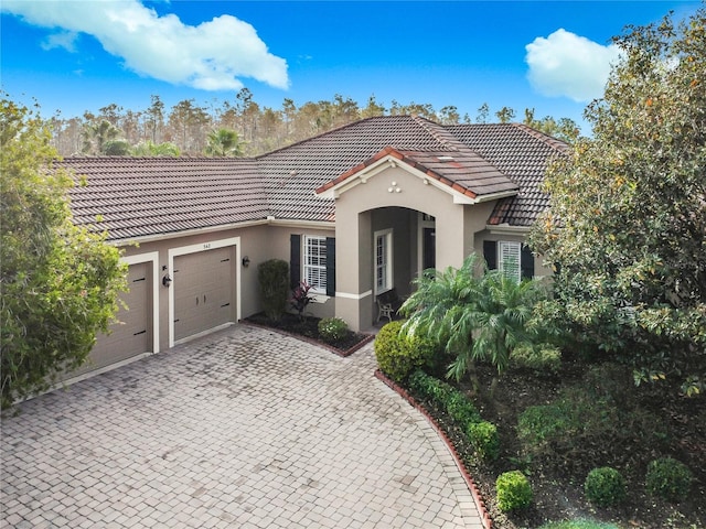 view of front of home featuring a garage