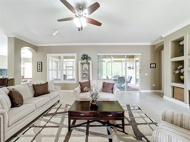 living room featuring ceiling fan, crown molding, and light tile patterned floors