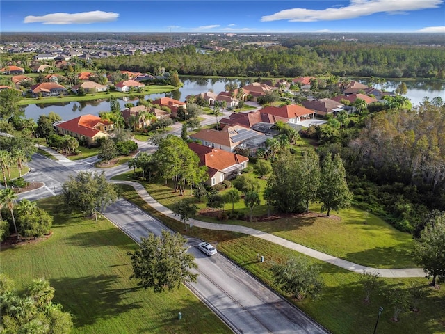 drone / aerial view with a water view