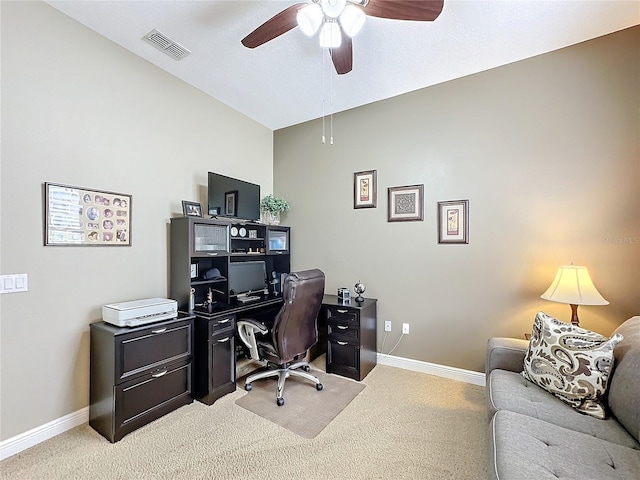 office with carpet flooring and ceiling fan