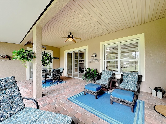 view of patio with ceiling fan