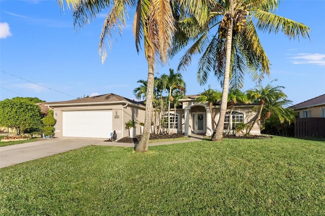 single story home with a front yard and a garage