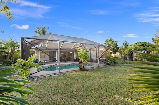 exterior space featuring a lanai and a lawn