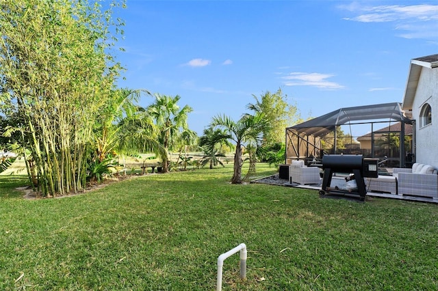 view of yard featuring a lanai