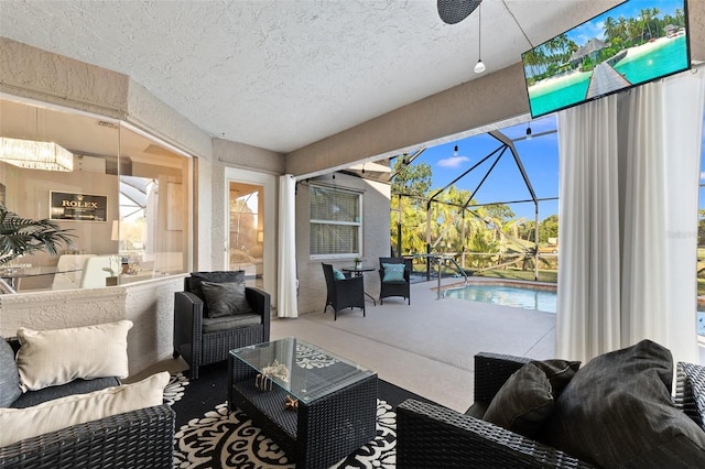 living room with carpet floors and a textured ceiling