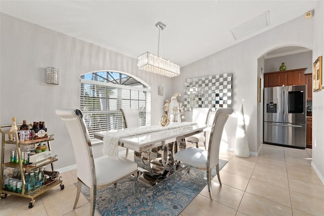 dining area featuring light tile patterned floors