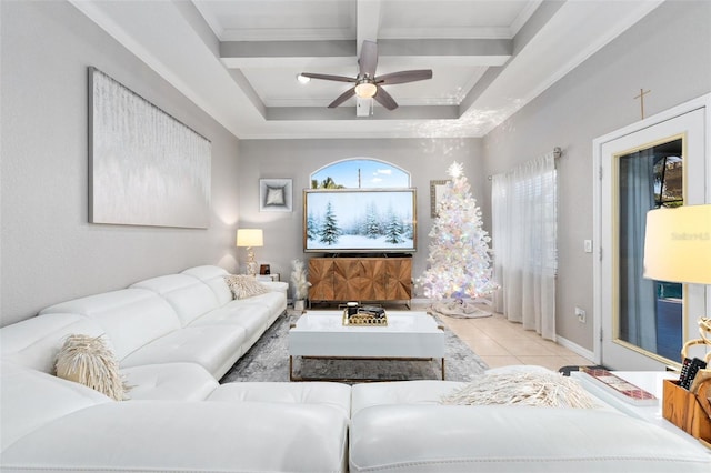 living room with ornamental molding, coffered ceiling, ceiling fan, light tile patterned floors, and beamed ceiling