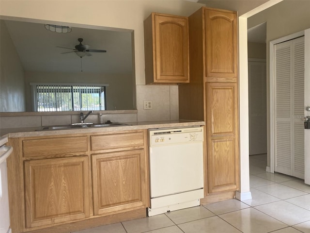 34 Pine Island Cir, Kissimmee, FL 34743 - kitchen with white dishwasher, a ceiling fan, light tile patterned flooring, and light countertops