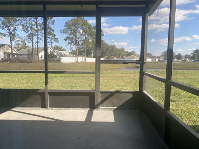 34 Pine Island Cir, Kissimmee, FL 34743 - unfurnished sunroom featuring a water view and healthy amount of natural light