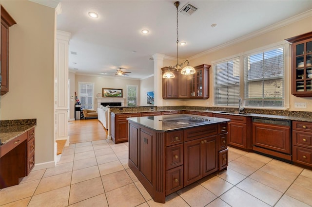 kitchen with paneled dishwasher, ornamental molding, ceiling fan with notable chandelier, sink, and pendant lighting