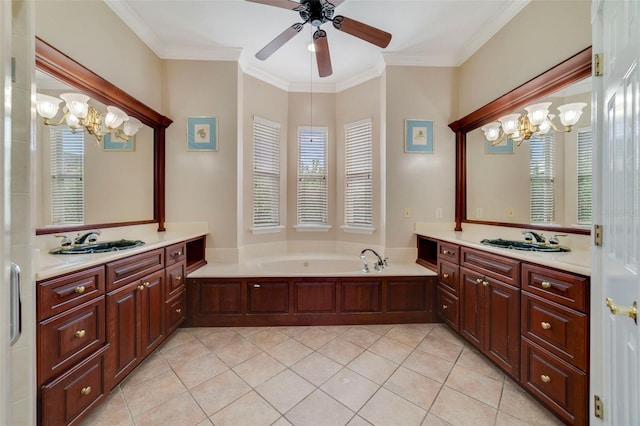 bathroom featuring a bathing tub, a wealth of natural light, vanity, and ceiling fan with notable chandelier