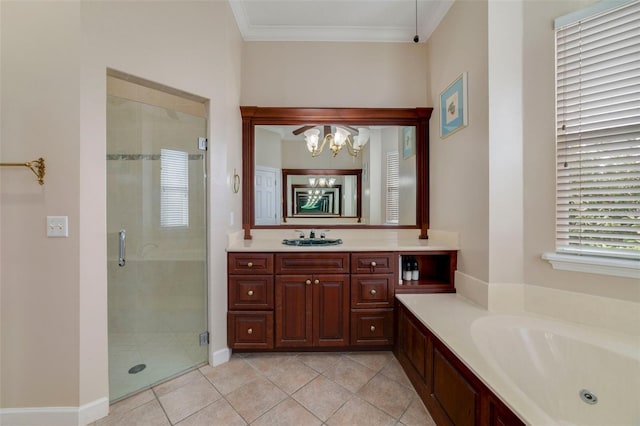 bathroom featuring plus walk in shower, a notable chandelier, tile patterned floors, crown molding, and vanity