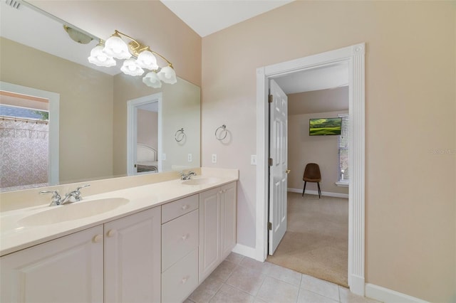 bathroom featuring tile patterned floors and vanity