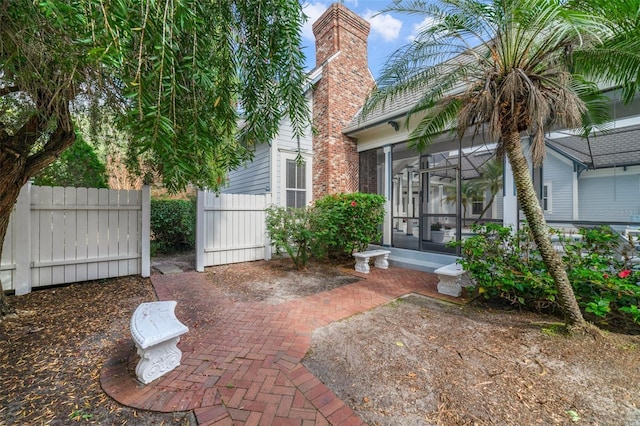 view of patio / terrace with a sunroom