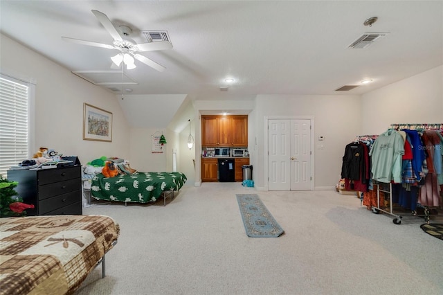 bedroom with light carpet and ceiling fan