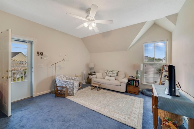 sitting room with carpet floors, ceiling fan, and lofted ceiling