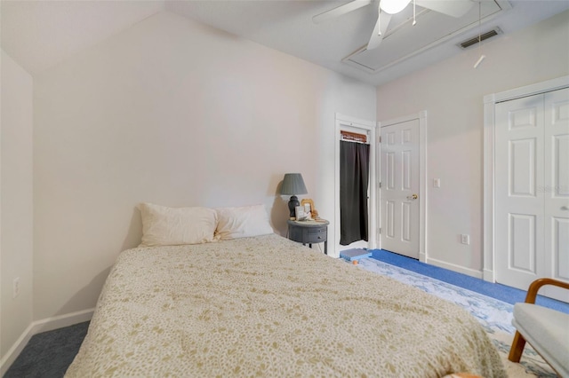 carpeted bedroom featuring ceiling fan and a closet