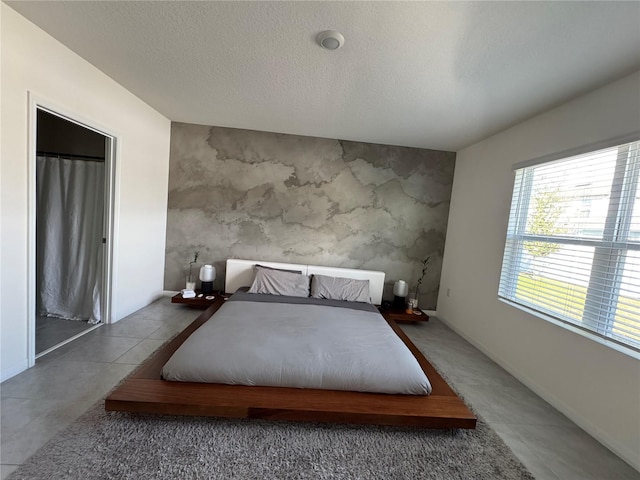 unfurnished bedroom featuring concrete flooring