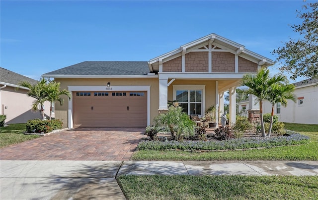 craftsman house with a garage