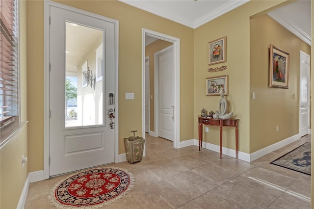 tiled entryway with ornamental molding