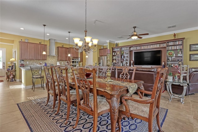 tiled dining room featuring crown molding and ceiling fan with notable chandelier