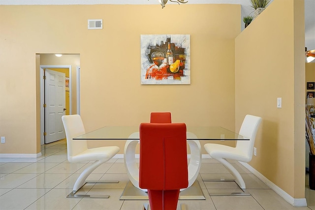 dining space with light tile patterned flooring