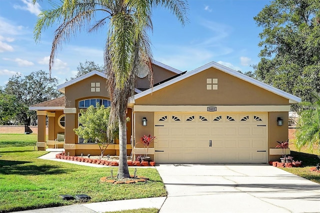 view of front facade featuring a front yard and a garage