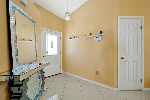 foyer entrance with tile patterned flooring