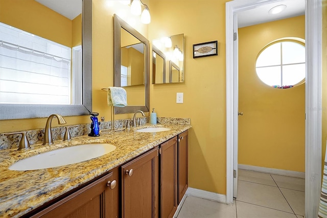 bathroom with vanity, tile patterned floors, and plenty of natural light