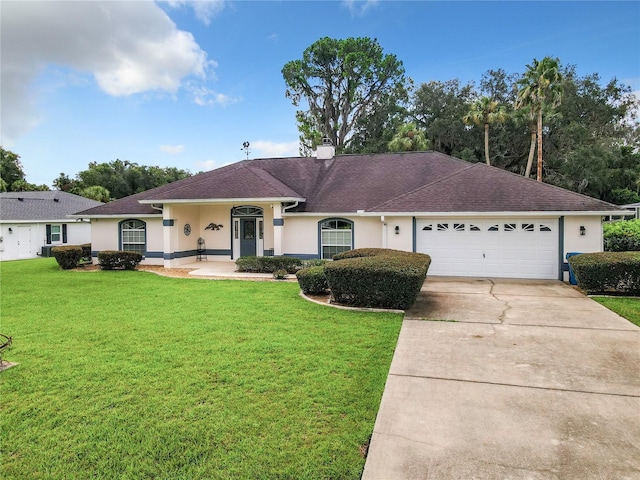 1281 N Timucuan Trl, Inverness, FL 34453 - ranch-style house featuring a garage and a front lawn