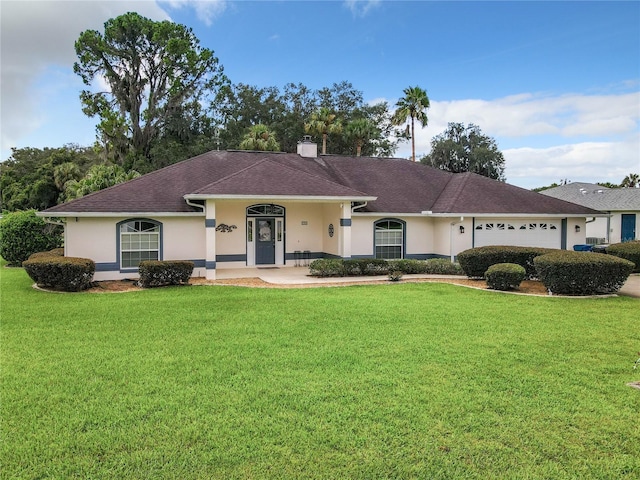 1281 N Timucuan Trl, Inverness, FL 34453 - single story home featuring covered porch, a garage, and a front lawn