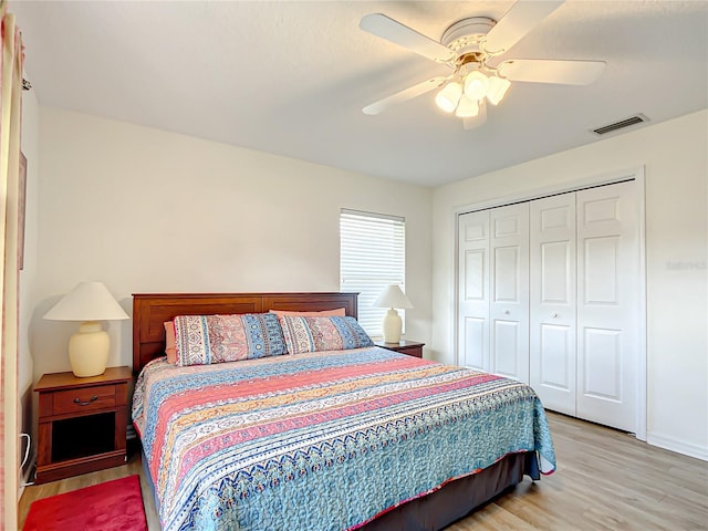 1281 N Timucuan Trl, Inverness, FL 34453 - bedroom with ceiling fan, a closet, and light wood-type flooring