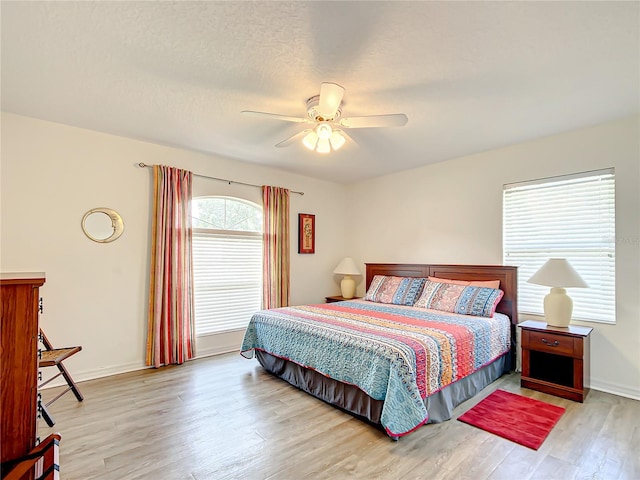 1281 N Timucuan Trl, Inverness, FL 34453 - bedroom with ceiling fan and light hardwood / wood-style floors