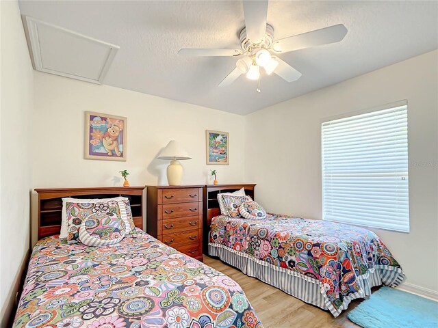 1281 N Timucuan Trl, Inverness, FL 34453 - bedroom with ceiling fan and light hardwood / wood-style flooring