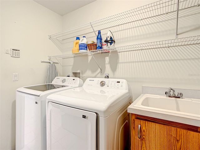 1281 N Timucuan Trl, Inverness, FL 34453 - washroom with washer and clothes dryer, cabinets, and sink