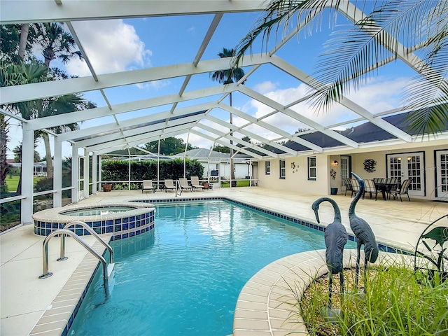 1281 N Timucuan Trl, Inverness, FL 34453 - view of swimming pool with glass enclosure, an in ground hot tub, and a patio area
