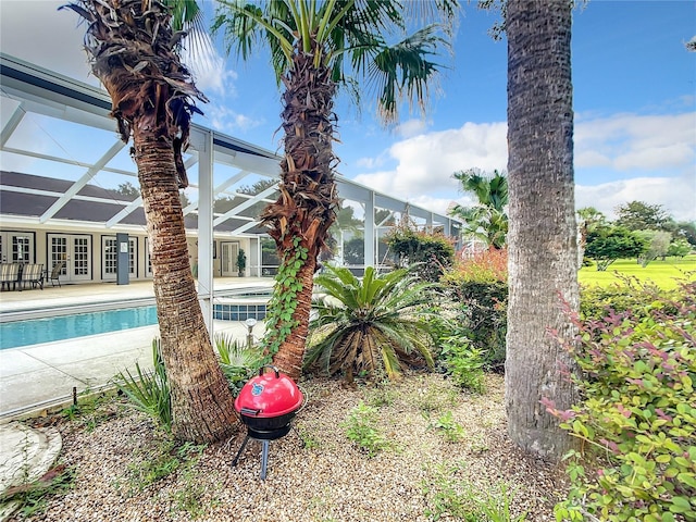 1281 N Timucuan Trl, Inverness, FL 34453 - exterior space with a lanai and french doors