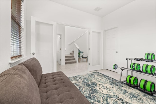 living area featuring light tile patterned floors