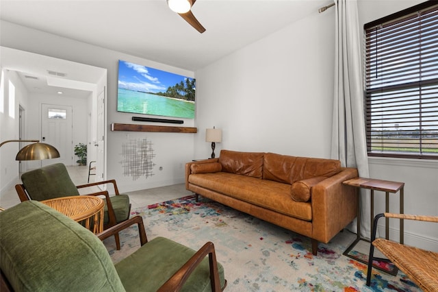 living room featuring ceiling fan