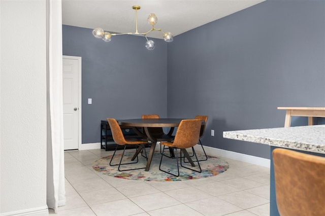 dining space featuring light tile patterned floors